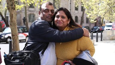 Seema Misra, who was jailed for a conviction of theft in 2010, celebrates with her husband Davinder 